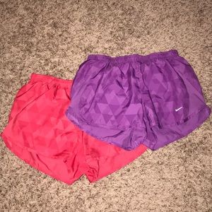 Two pairs of Nike shorts.